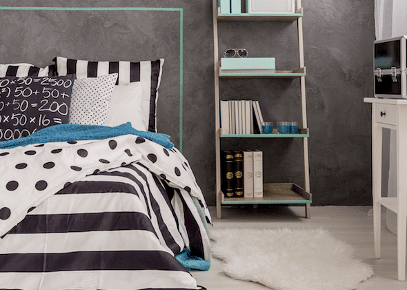 Modern Bedroom With a Dark Textured Accent Wall and Stylish Decor