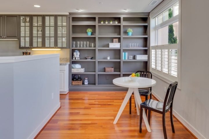 Greay painted walls with timber floorboards